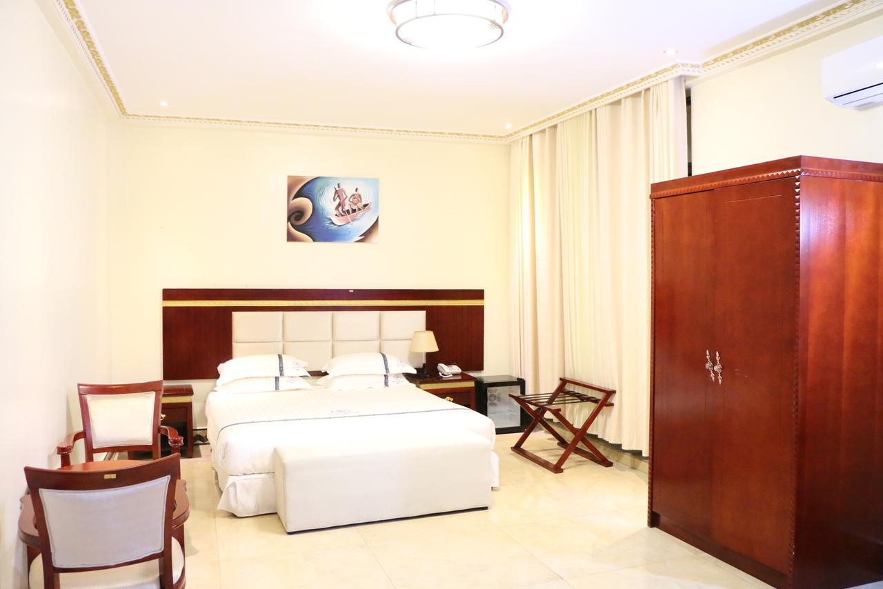 Dove Hotel Кигали Экстерьер фото