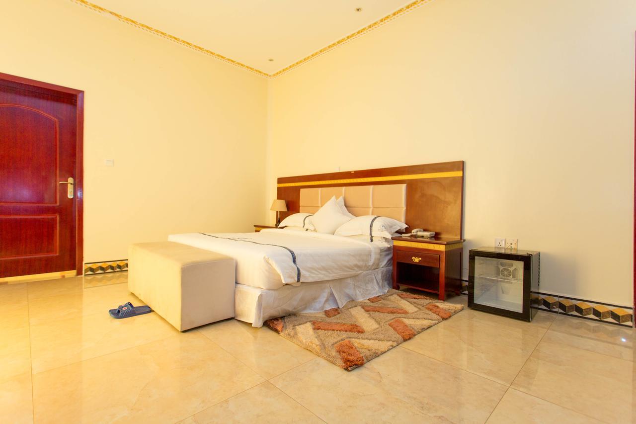 Dove Hotel Кигали Экстерьер фото