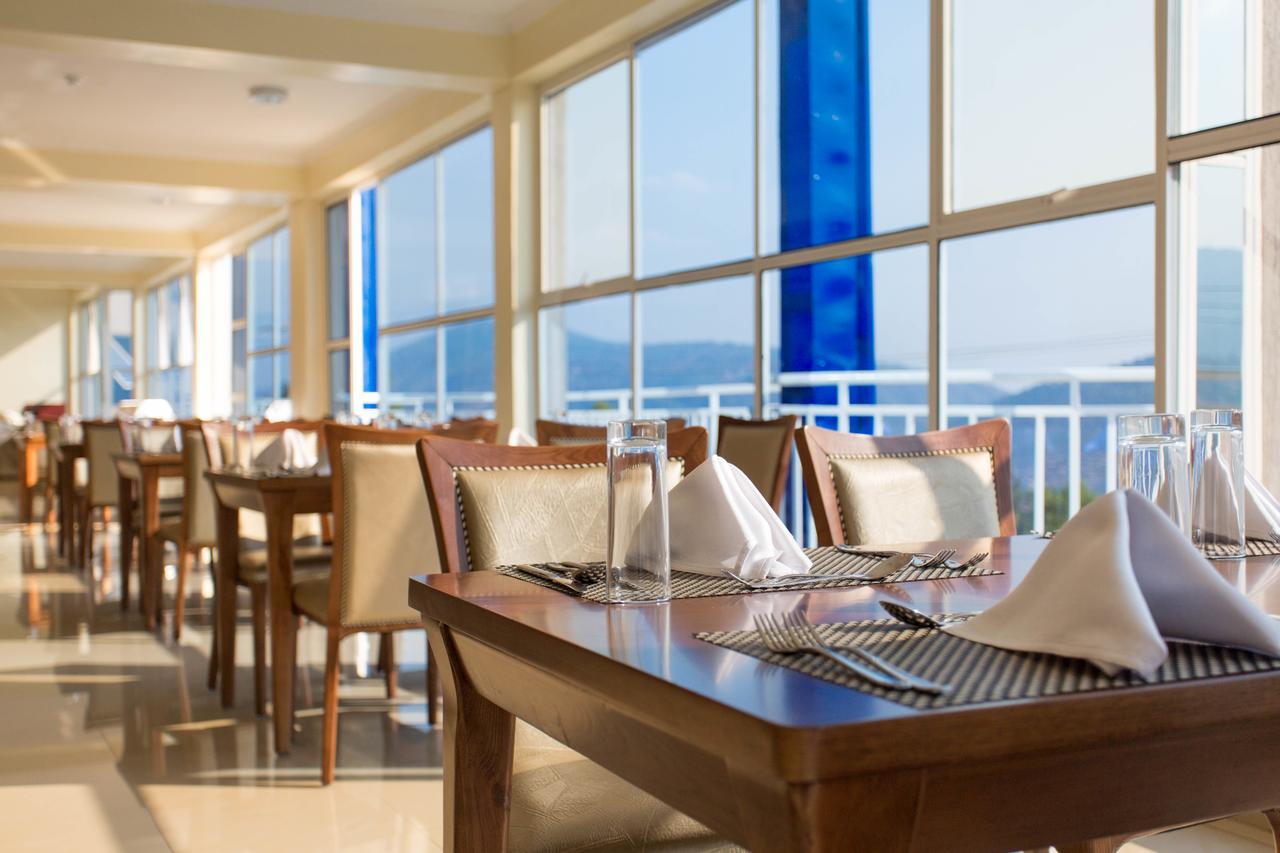Dove Hotel Кигали Экстерьер фото