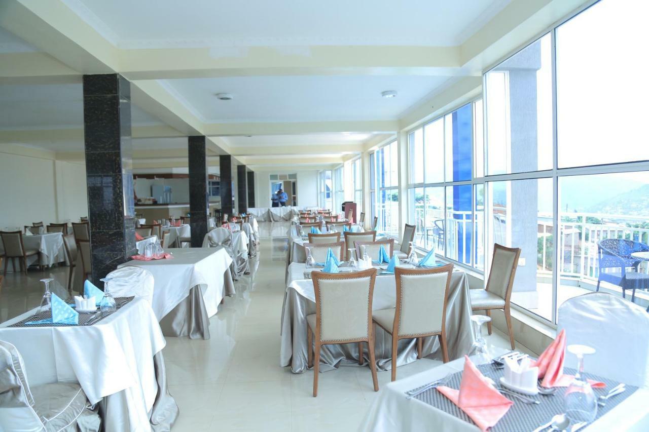 Dove Hotel Кигали Экстерьер фото